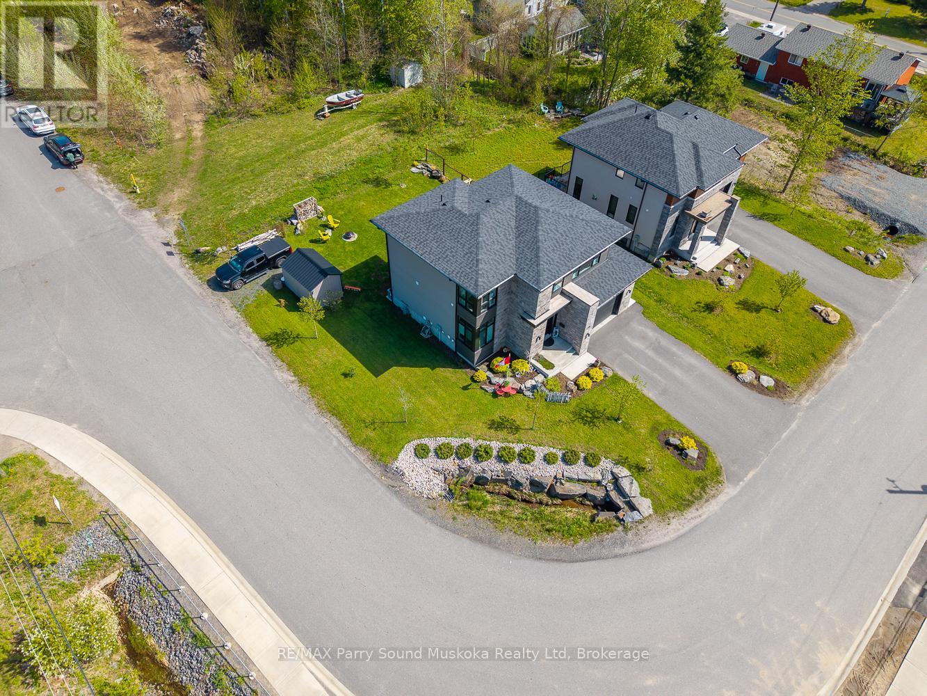 44 Dennis Drive, Parry Sound, Ontario  P2A 0E6 - Photo 4 - X12399454