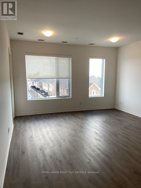 407 - 3285 Carding Mill Trail, Oakville, Ontario  L6M 1S1 - Photo 12 - W12399252