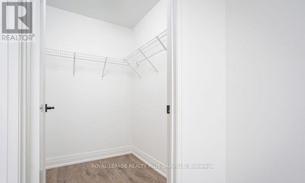 407 - 3285 Carding Mill Trail, Oakville, Ontario  L6M 1S1 - Photo 13 - W12399252
