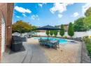View of swimming pool with a patio, a fenced backyard, a diving board, area for grilling, and a gazebo