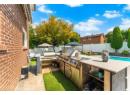 Fenced backyard featuring area for grilling, a patio area, and a gazebo