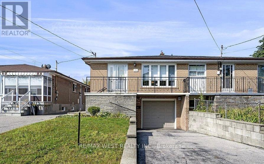 136 Duncanwoods Drive, Toronto, Ontario  M9L 2E1 - Photo 1 - W12396523