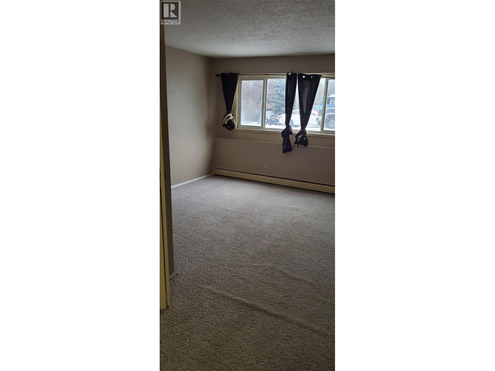 45 Ridgemont Avenue Unit# 102, Fernie, British Columbia  V0B 1M2 - Photo 2 - 10362719