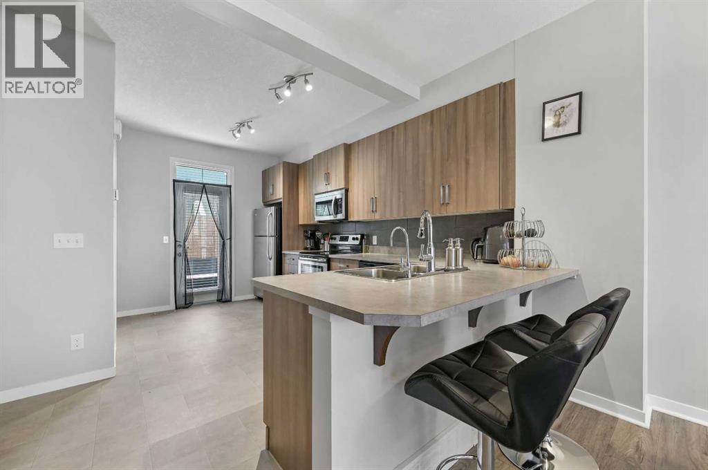 37 New Brighton Point Se, Calgary, Alberta  T2Z 1B6 - Photo 6 - A2250449