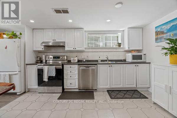 97 Westhampton Drive, Toronto, Ontario  M9R 1Y1 - Photo 23 - W12399669