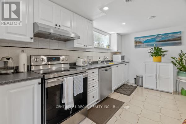 97 Westhampton Drive, Toronto, Ontario  M9R 1Y1 - Photo 24 - W12399669