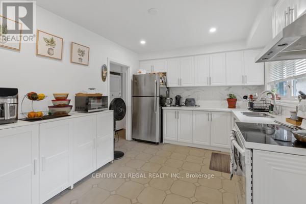97 Westhampton Drive, Toronto, Ontario  M9R 1Y1 - Photo 8 - W12399669