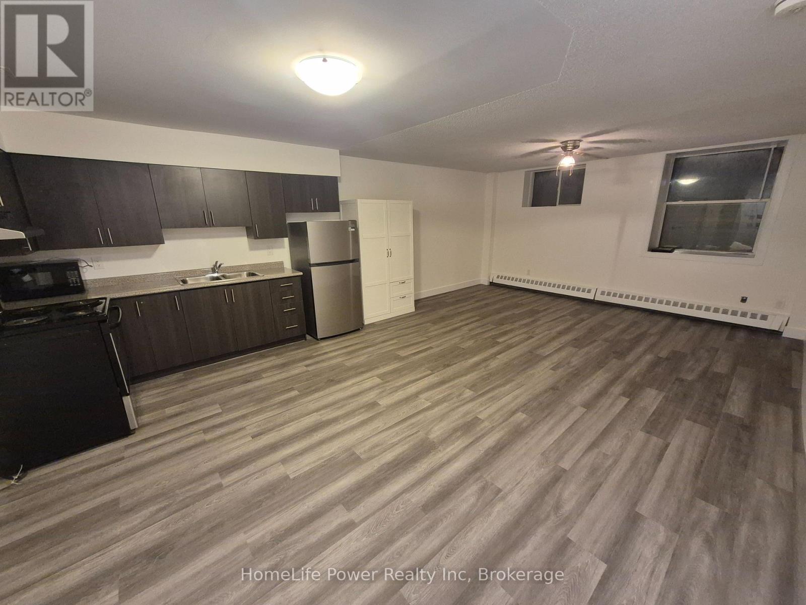 107 - 27 Bridge Street, Brantford, Ontario  N3T 3C9 - Photo 2 - X12400251