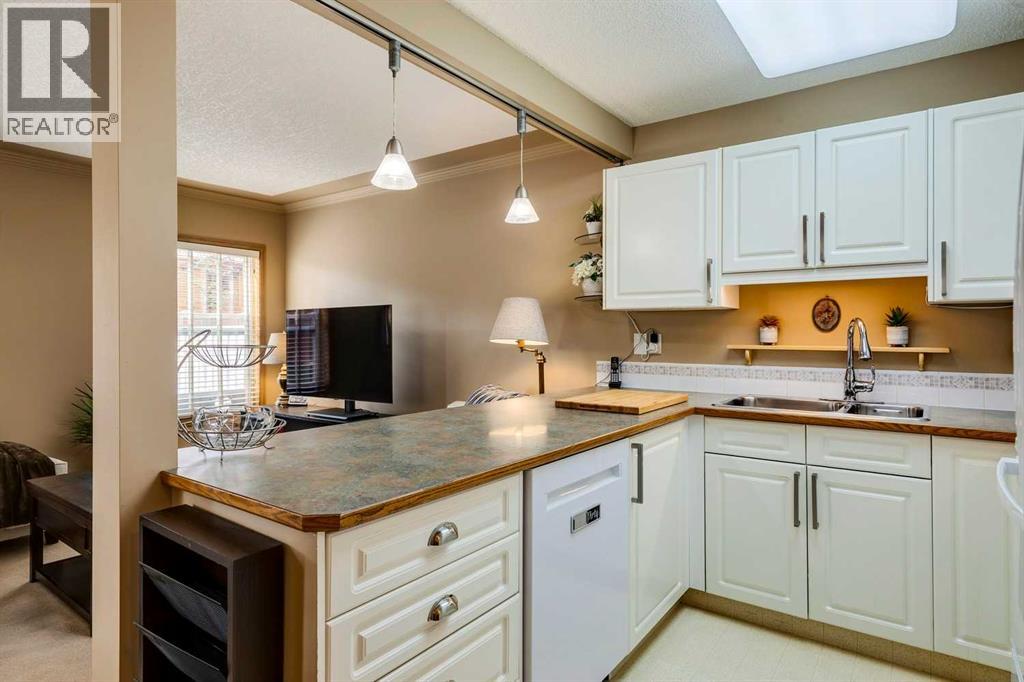 Property at 139 Country Hills Villas NW image 4