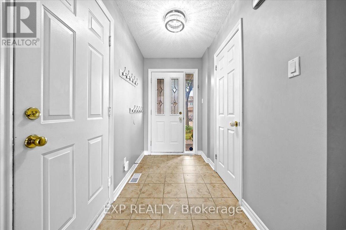 93 Cedarock Drive, Ottawa, Ontario  K2M 2H5 - Photo 3 - X12400570