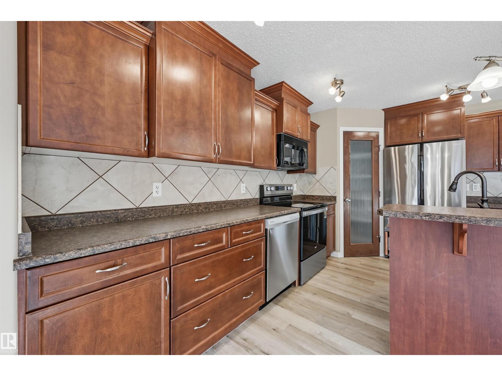 6919 Strom Ln Nw, Edmonton, Alberta  T6R 0G3 - Photo 17 - E4457523
