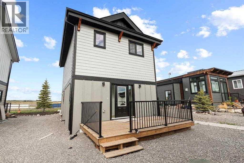 22 Cottageclub Lane, Rural Rocky View County, Alberta  T0L 1N0 - Photo 3 - A2256699