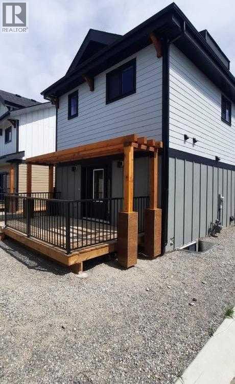 22 Cottageclub Lane, Rural Rocky View County, Alberta  T0L 1N0 - Photo 4 - A2256699