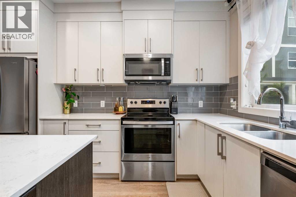 716 Redstone Crescent Ne, Calgary, Alberta  T3N 1M3 - Photo 11 - A2254978