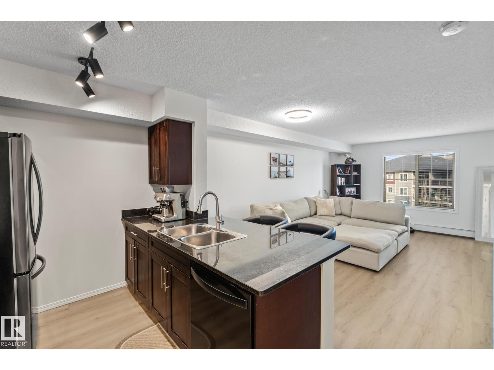 #409 1080 Mcconachie Blvd Nw, Edmonton, Alberta  T5Y 0X2 - Photo 1 - E4457550