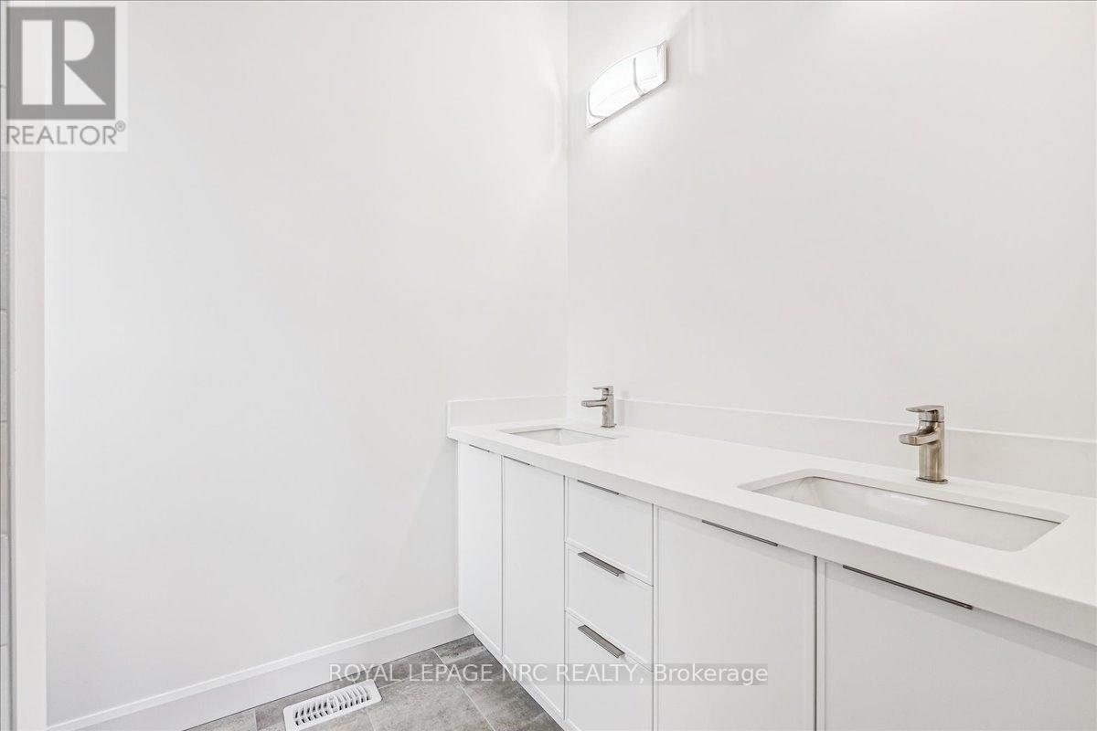 63 Beachwalk Crescent, Fort Erie (Crystal Beach), Ontario  L0S 1B0 - Photo 25 - X12400990