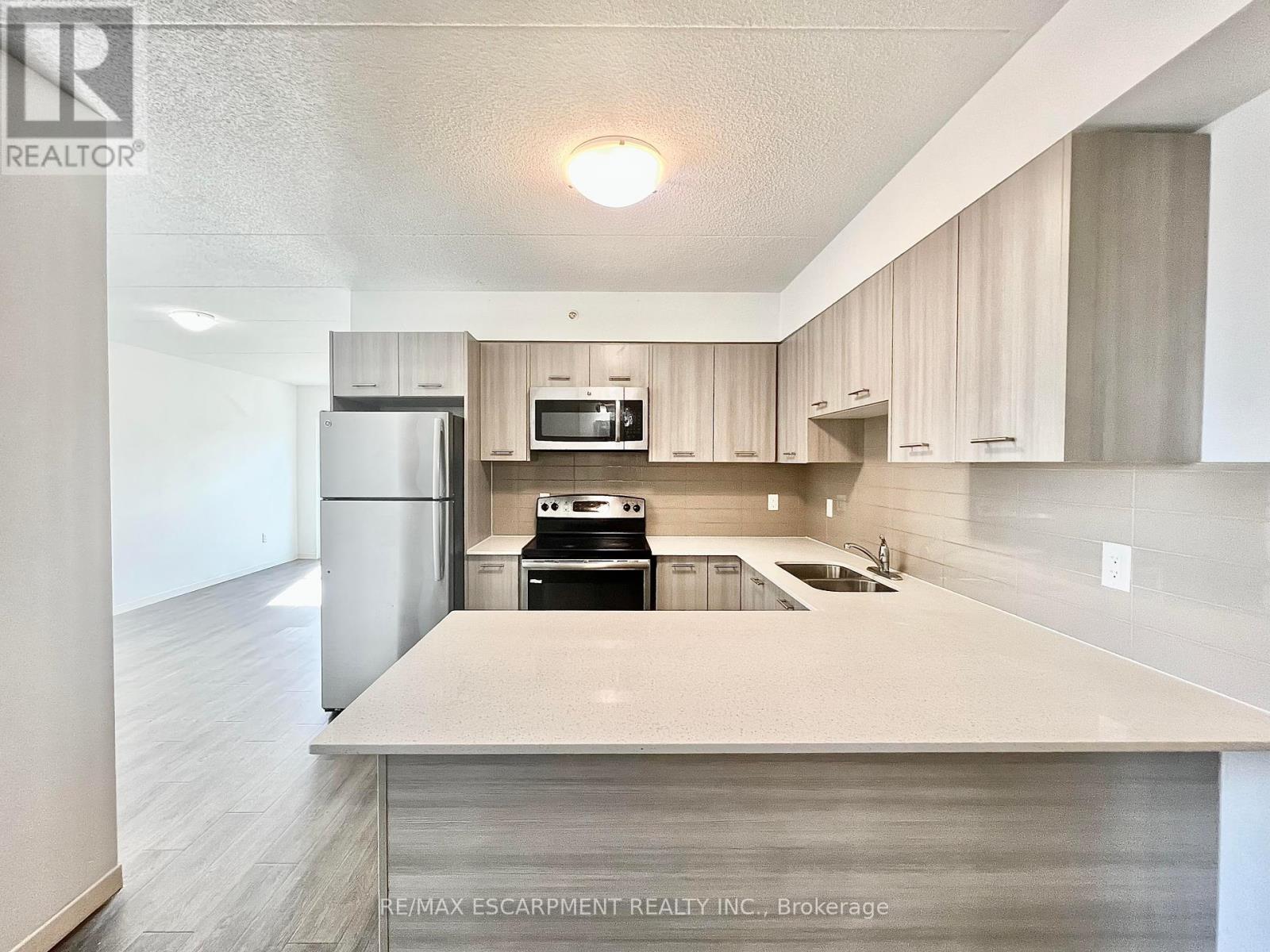 302 - 220 Cannon Street E, Hamilton, Ontario  L8L 2B1 - Photo 1 - X12401050