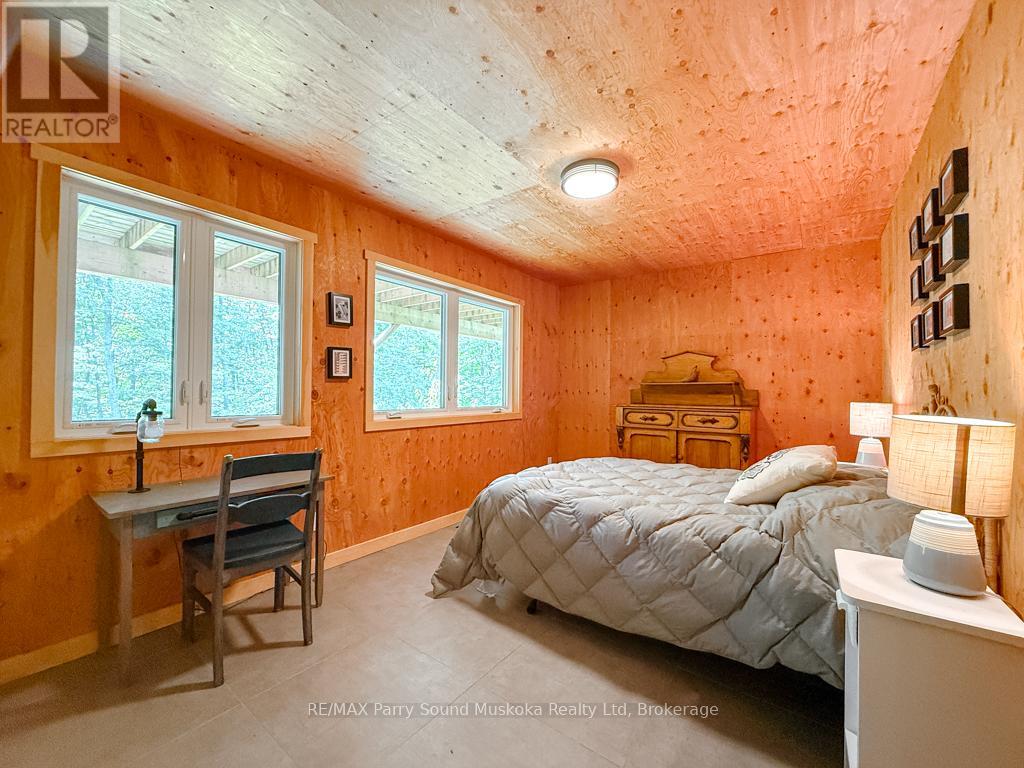 71 Crown Retreats Road, Whitestone, Ontario  P0A 1G0 - Photo 17 - X12401331