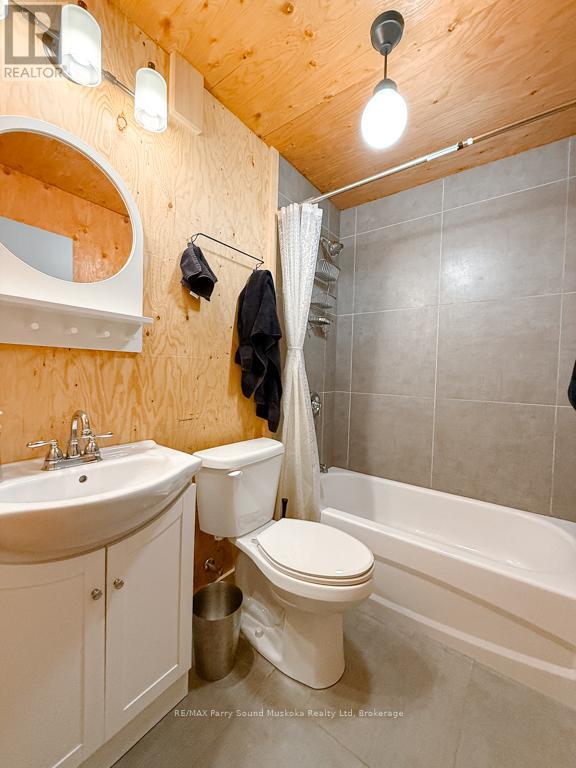 71 Crown Retreats Road, Whitestone, Ontario  P0A 1G0 - Photo 18 - X12401331