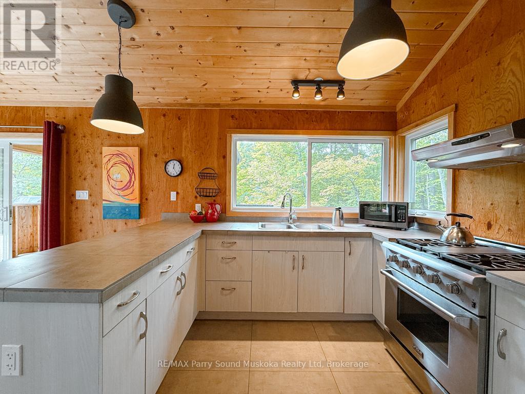 71 Crown Retreats Road, Whitestone, Ontario  P0A 1G0 - Photo 7 - X12401331