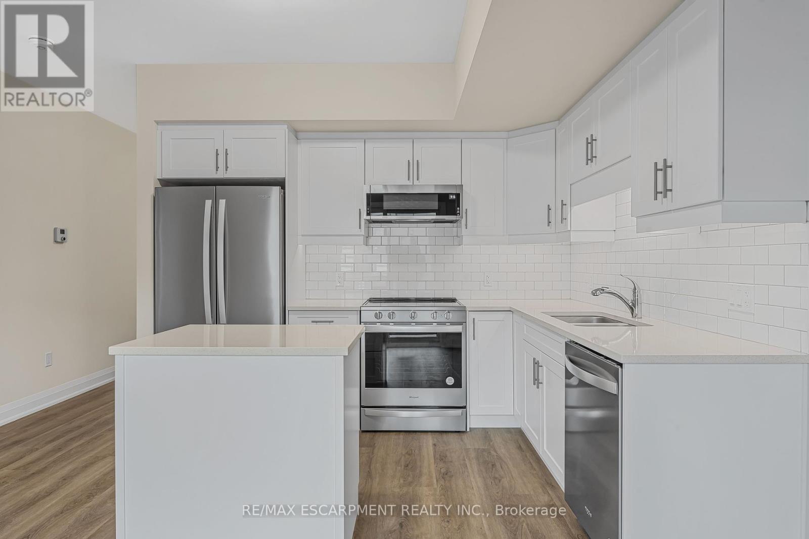 303 - 118 Summersides Boulevard, Pelham, Ontario  L0E 1E1 - Photo 17 - X12364103