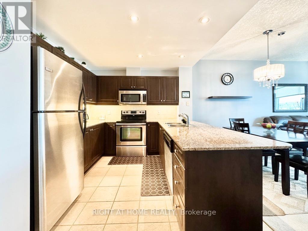 703 - 37 Ellen Street, Barrie, Ontario  L4N 6G2 - Photo 2 - S12402075