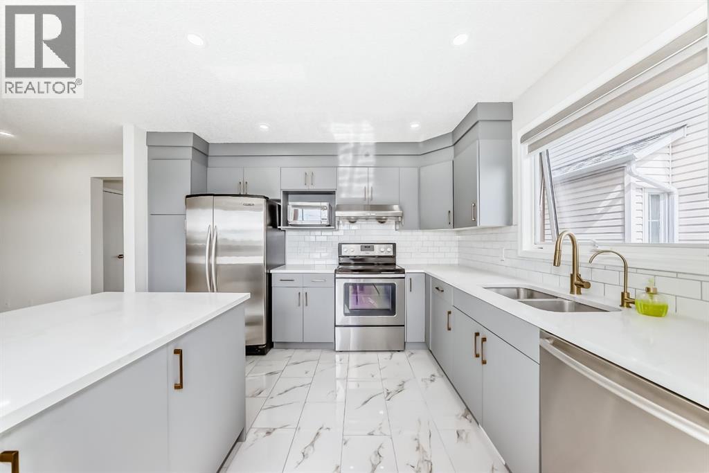 105 Del Ray Road, Calgary, Alberta  T1Y 6V6 - Photo 6 - A2252009