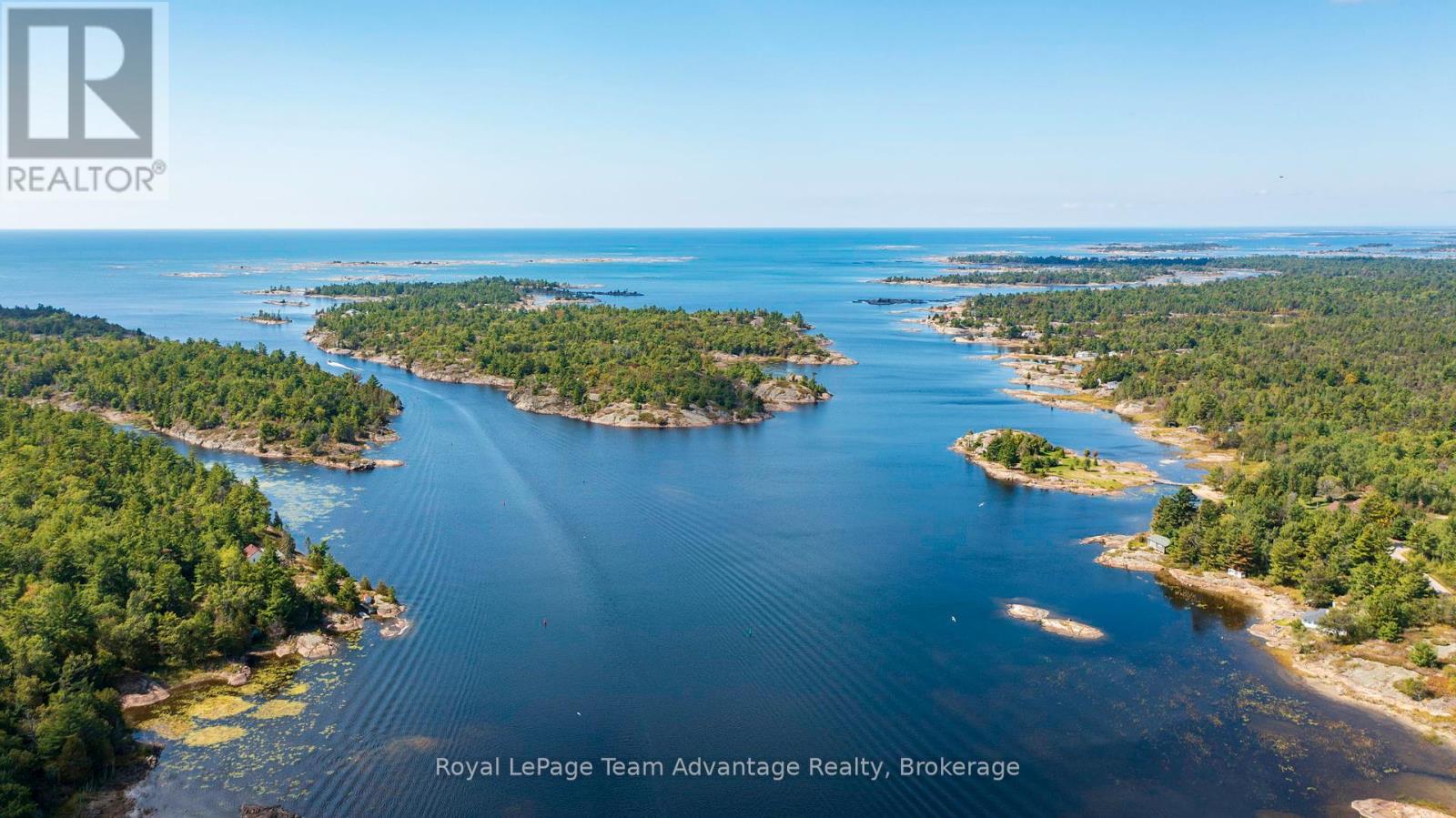 2046 Riverside Drive, Parry Sound Remote Area, Ontario  P0G 1A0 - Photo 4 - X12402251