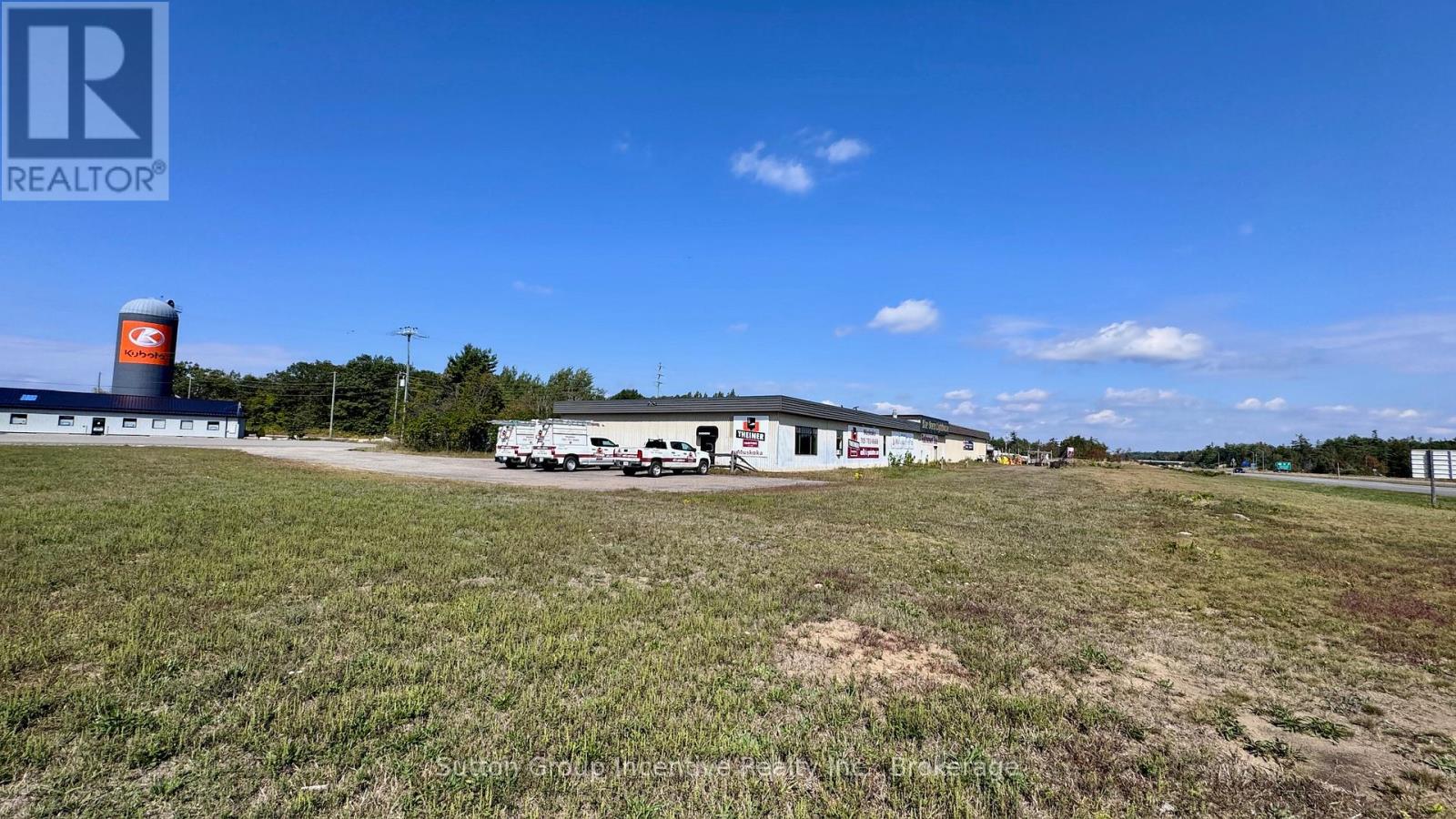 HOME OF MUSKOKA FIRE PITS. Prime Location, 1676 Winhara Rd, Gravenhurst, Muskoka Commercial Property with C3 Zoning. The existing building, constructed in the 1980s, is 12,212 sq ft. and comprises three buildings under one roof, each with its own entrance and parking area. 1,100 feet of uninterrupted highway exposure is hard to find anywhere in the corridor, immediately off Exit 182 near Highway 118, from the border of Bracebridge. This commercial location is situated beside a primary highway with easy access to the Bracebridge core. ALSO available for Lease. VTB Vendor Take-Back Available over 5 years, 25% down. Two parcels are part of this package. The North Lot is a Combination of Building and Land, while the South Lot is land only. The businesses are not included in the sale:  Muskoka Fire Pits is available for sale in a separate listing. Central area for light manufacturing, a showroom, and a warehouse that supports various uses, including clear heights of just over 11 and 14 feet, as well as several man doors, and several interior and exterior 10- and 12-foot-wide garage doors. Please take a look at the Floor Plan. 600 V 3 Phase. Vacant possession is possible; any leases will include early termination clauses ranging from 30 to 120 days.  This is an MTO control area. This is in an Airport area with height and food vendor restrictions. Subject to HST (id:48254)