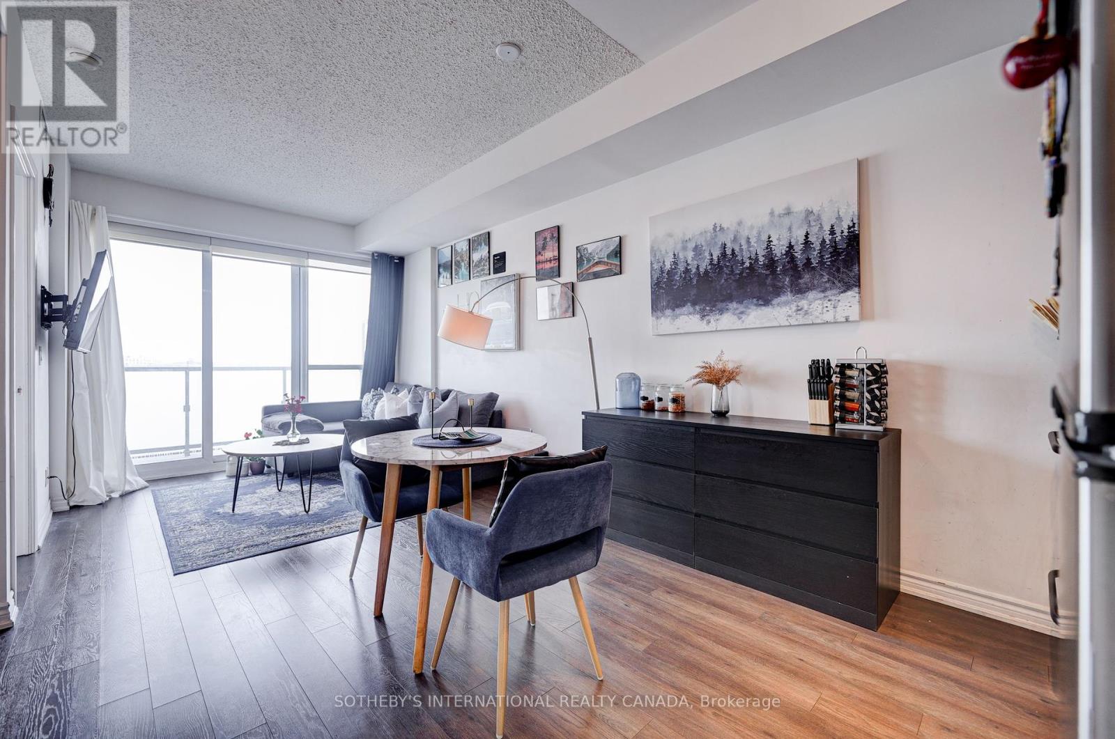 712 - 15 James Finlay Way, Toronto, Ontario  M3M 0B3 - Photo 1 - W12402295