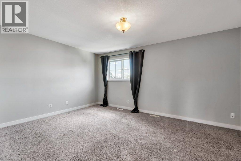 420 Ranch Ridge Meadow, Strathmore, Alberta  T1P 0A9 - Photo 16 - A2243696