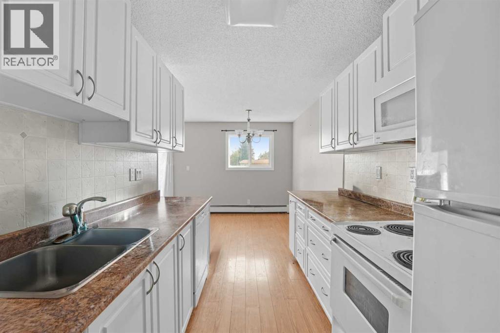 205, 25 Robinson Avenue, Penhold, Alberta  T0M 1R0 - Photo 2 - A2256991