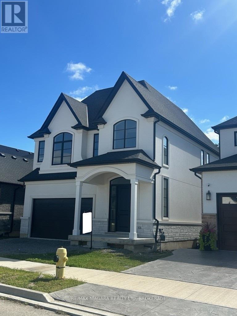 21 Ivy Crescent, Thorold (Confederation Heights), Ontario  L2V 0J9 - Photo 5 - X12395851