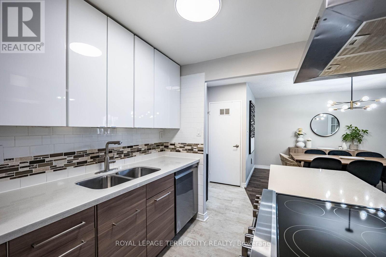 210 - 299 Mill Road, Toronto, Ontario  M9C 4V9 - Photo 18 - W12403020
