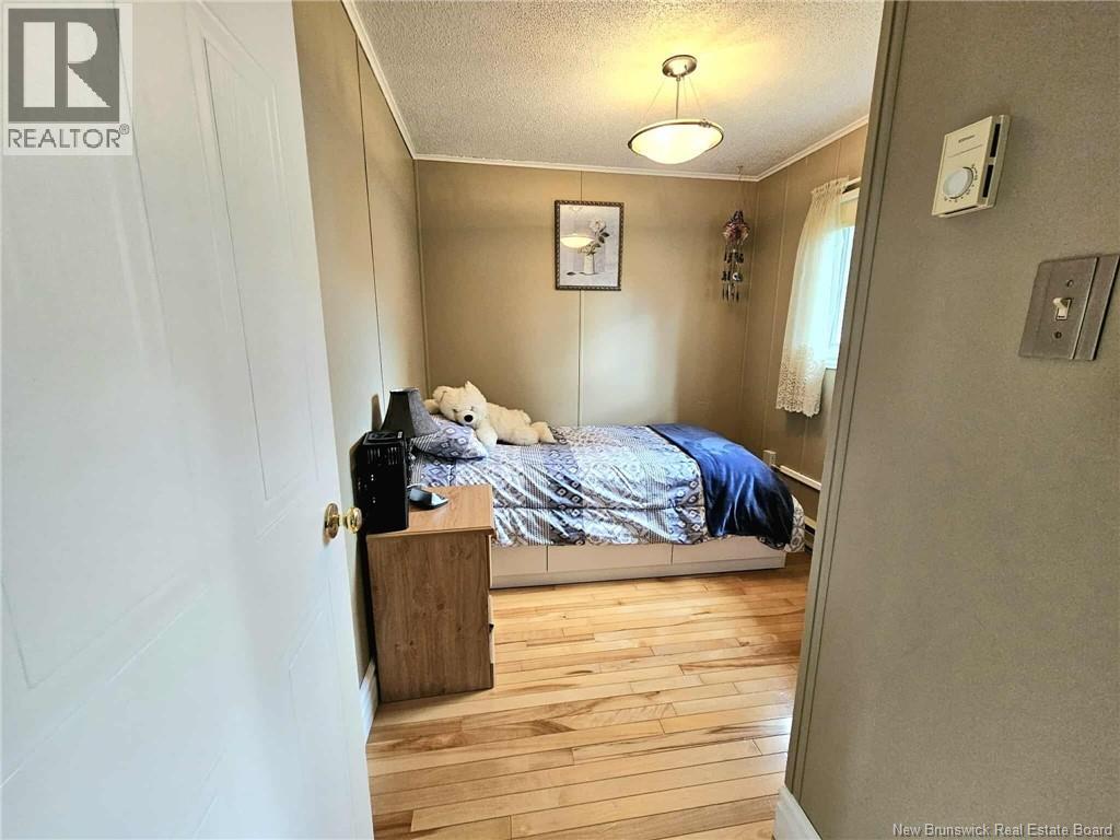 253 Birchgrove, Beresford, New Brunswick  E8K 1E9 - Photo 34 - NB126691