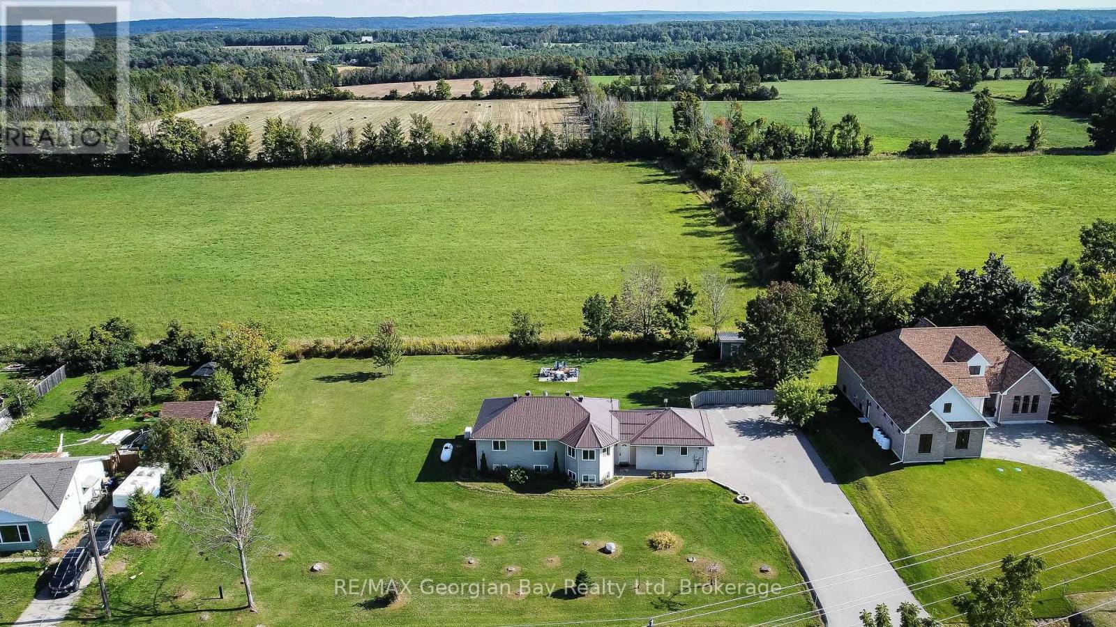 4989 Vasey Road, Oro-Medonte, Ontario L4R 4K3 - Photo 5 - S12403683