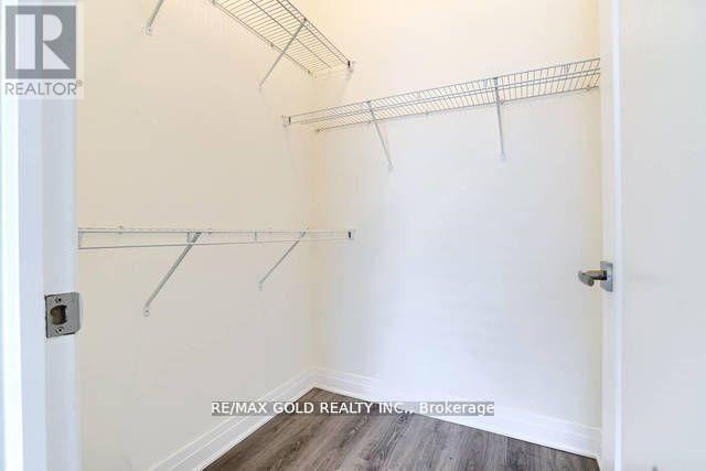 607 - 128 Grovewood Common, Oakville, Ontario  L6H 0X3 - Photo 11 - W12403450
