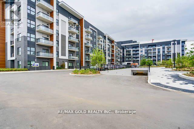 607 - 128 Grovewood Common, Oakville, Ontario  L6H 0X3 - Photo 2 - W12403450