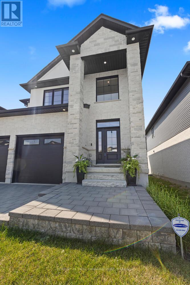1907 Fountain Grass Drive, London South, Ontario  N6K 0M2 - Photo 4 - X12403871
