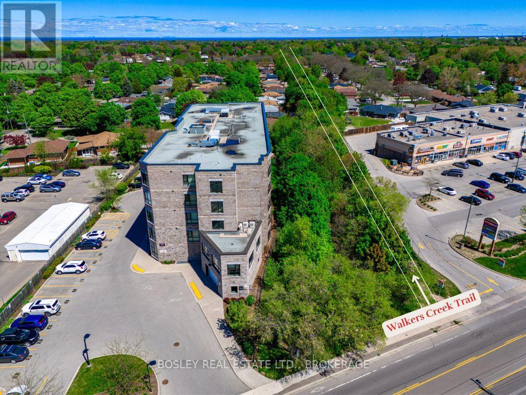 202 - 379 Scott Street, St. Catharines, Ontario  L2M 3W2 - Photo 2 - X12404056