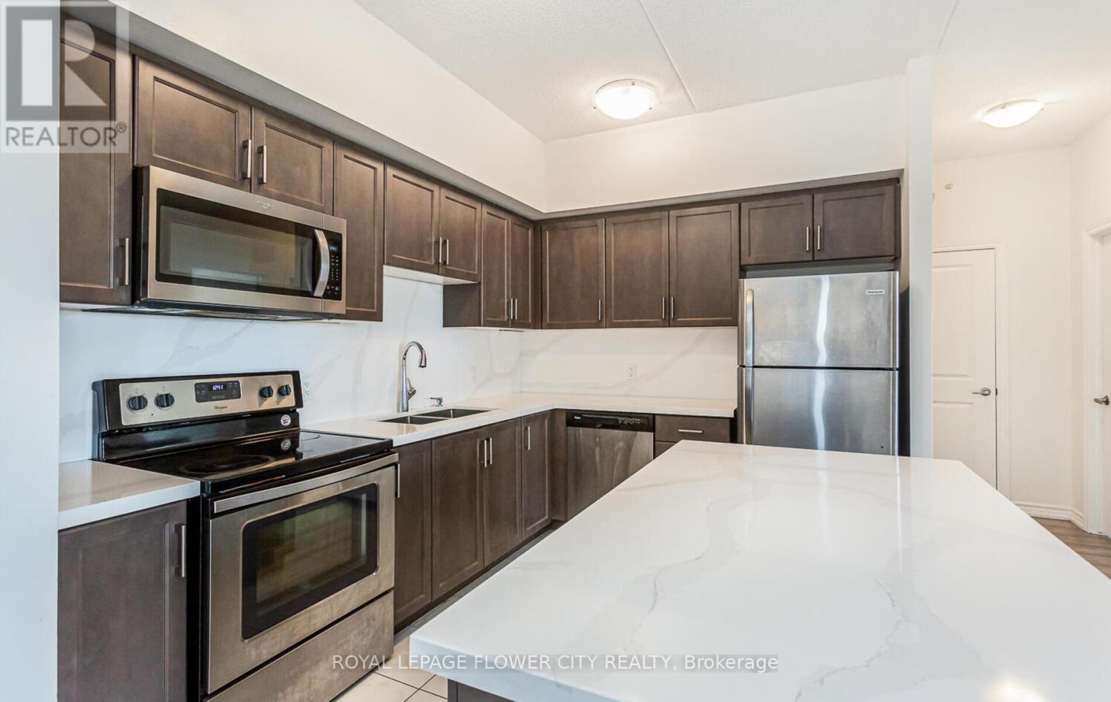 313 - 640 Sauve Street, Milton, Ontario  L9T 8M4 - Photo 17 - W12404052