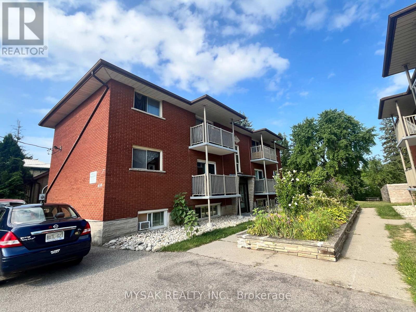 419 Lancaster Street W, Kitchener, Ontario  N2H 4V8 - Photo 2 - X12404090