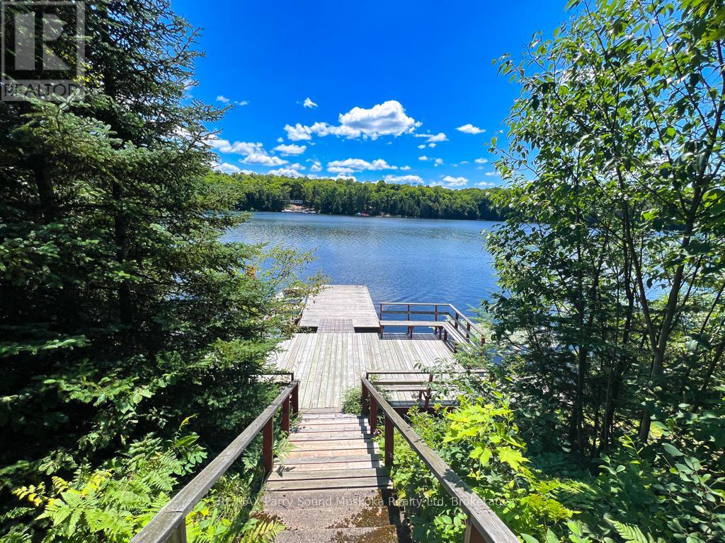 20 Golden Horseshoe Lane, Whitestone, Ontario  P0A 1G0 - Photo 29 - X12053152