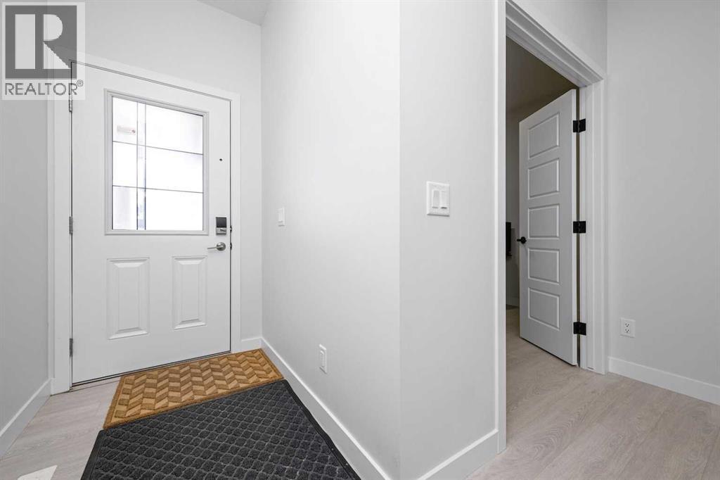 336 Lucas Way Nw, Calgary, Alberta  T3P 0R5 - Photo 3 - A2237148