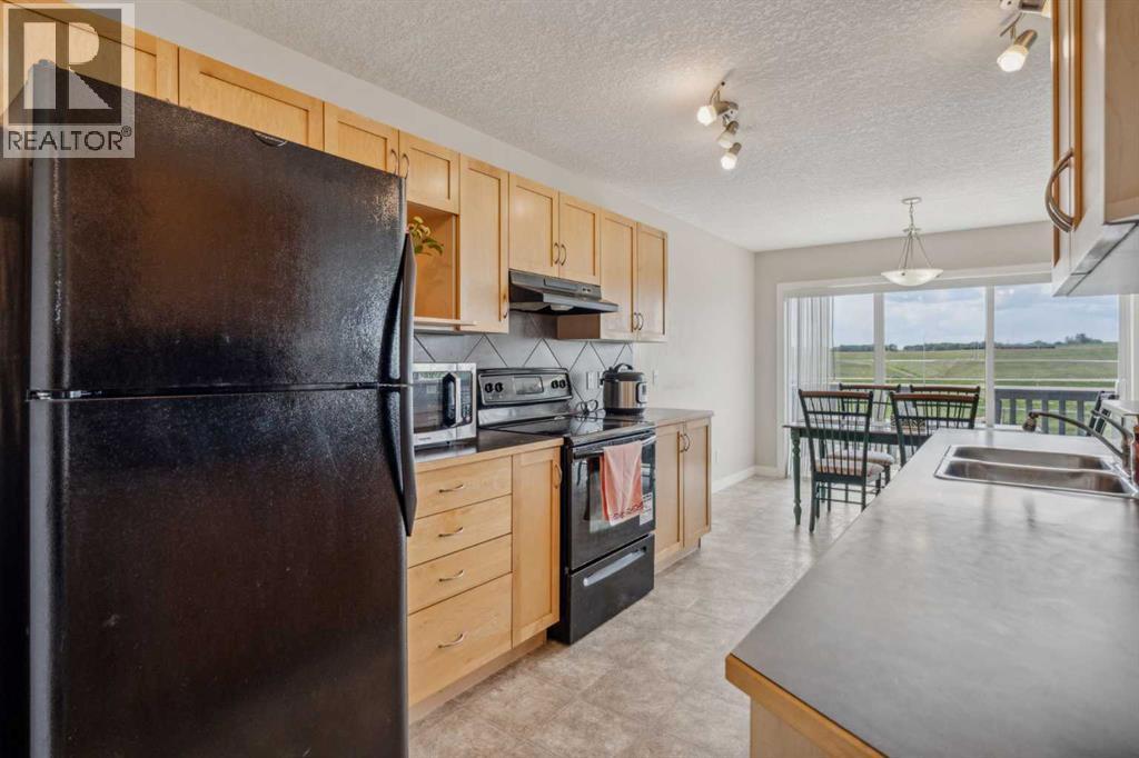 91 Bridlecrest Street Sw, Calgary, Alberta  T2Y 4Y8 - Photo 13 - A2254475