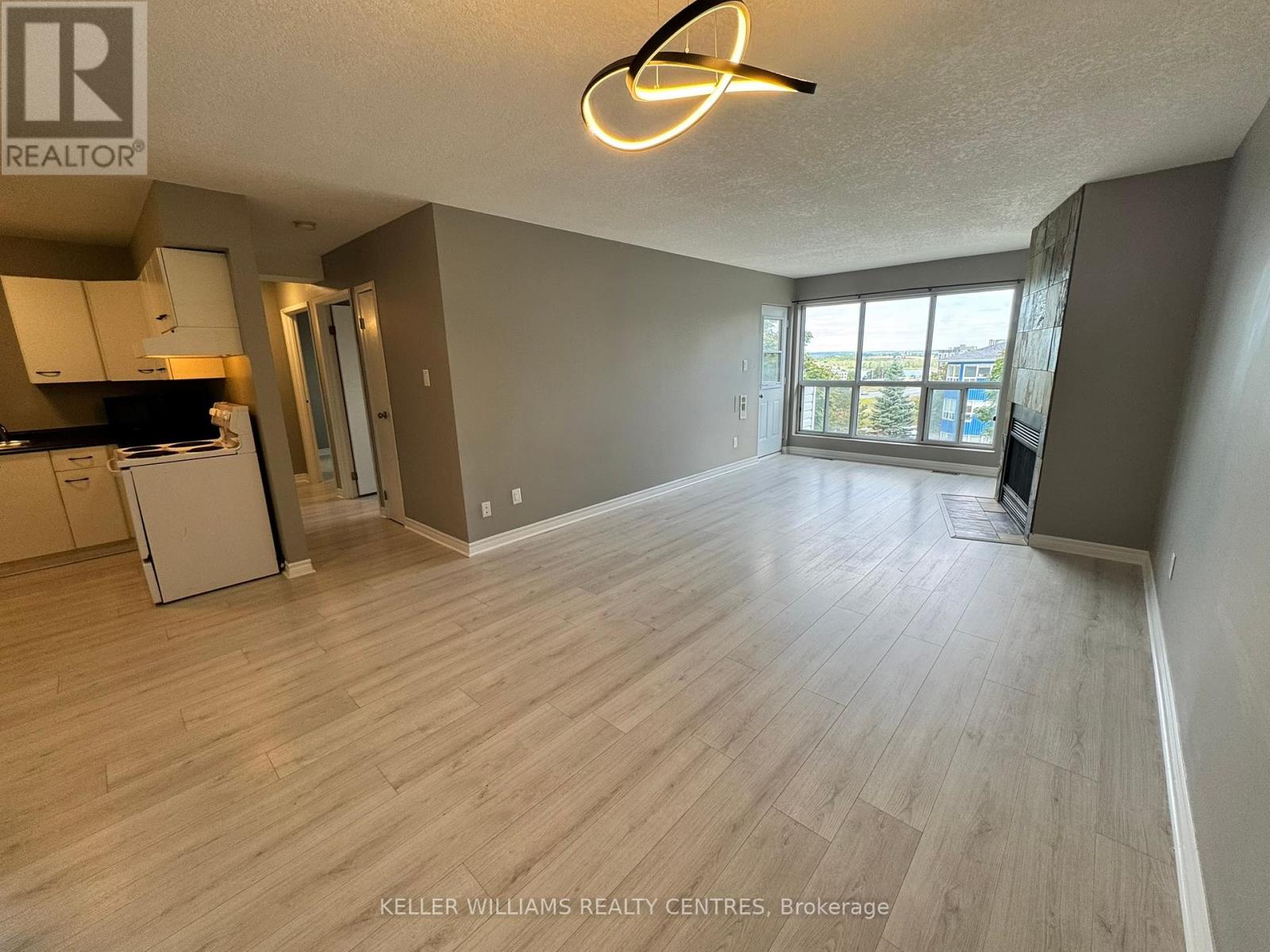 414 - 126 Bell Farm Road, Barrie, Ontario  L4M 6J3 - Photo 1 - S12404613