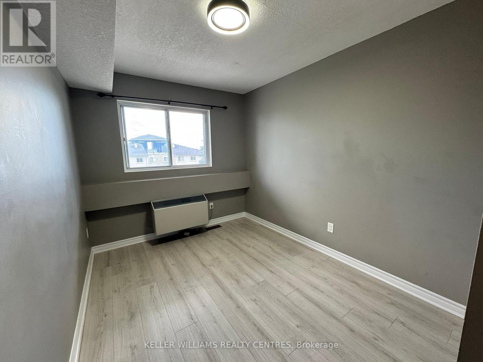 414 - 126 Bell Farm Road, Barrie, Ontario  L4M 6J3 - Photo 11 - S12404613