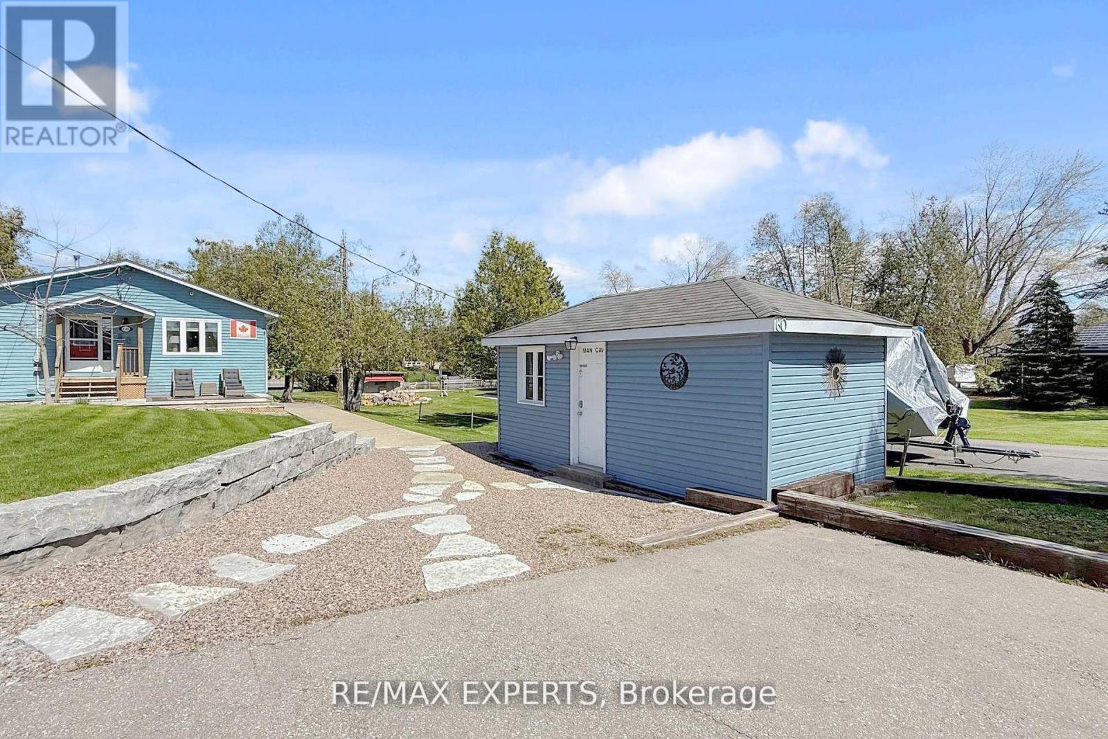 60 River Drive, Kawartha Lakes, Ontario  K0M 1N0 - Photo 4 - X12404858