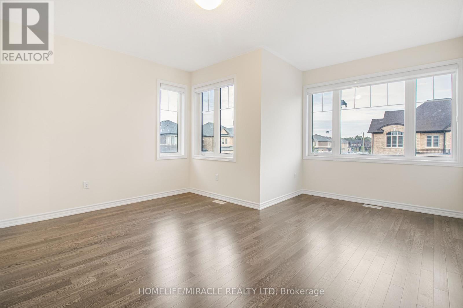 63 Lipscott Drive, Caledon, Ontario  L7C 4K1 - Photo 8 - W12396845