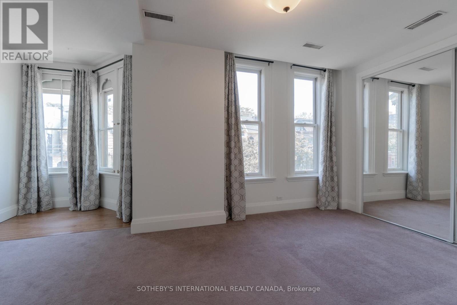 Unit 2 - 215-217 Carlton Street, Toronto, Ontario  M5A 2K9 - Photo 11 - C12405242
